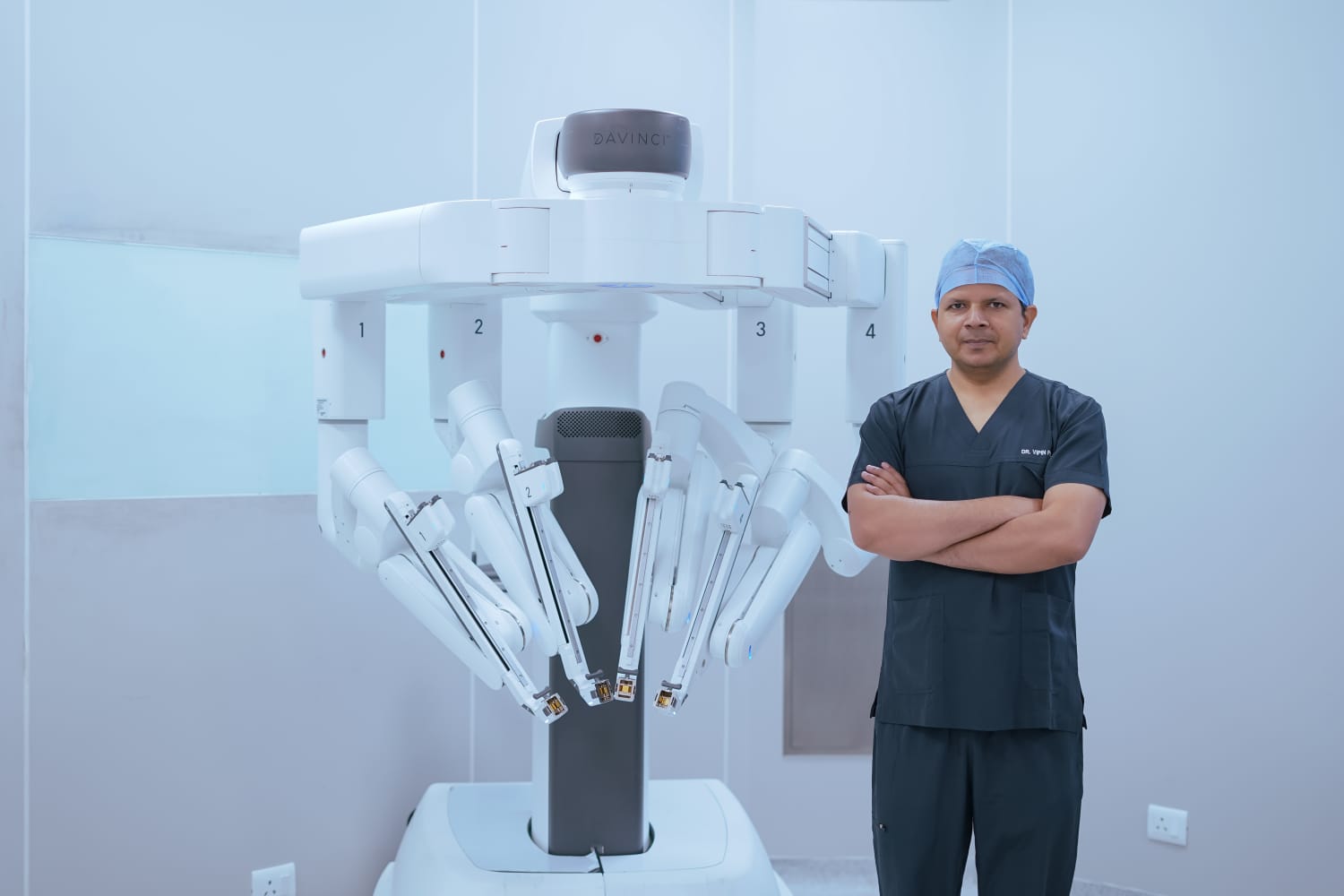 Dr. Vipin Kumar Pal Singh in a surgical setting reflecting clinical expertise
